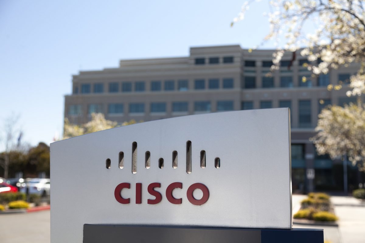 "San Jose, United States - February 11, 2013: A large Cisco Systems sign sits outside their headquarters located at 400 Tasman Dr. in San Jose California. Cisco Systems is a multinational company that produces computer networking equipment."